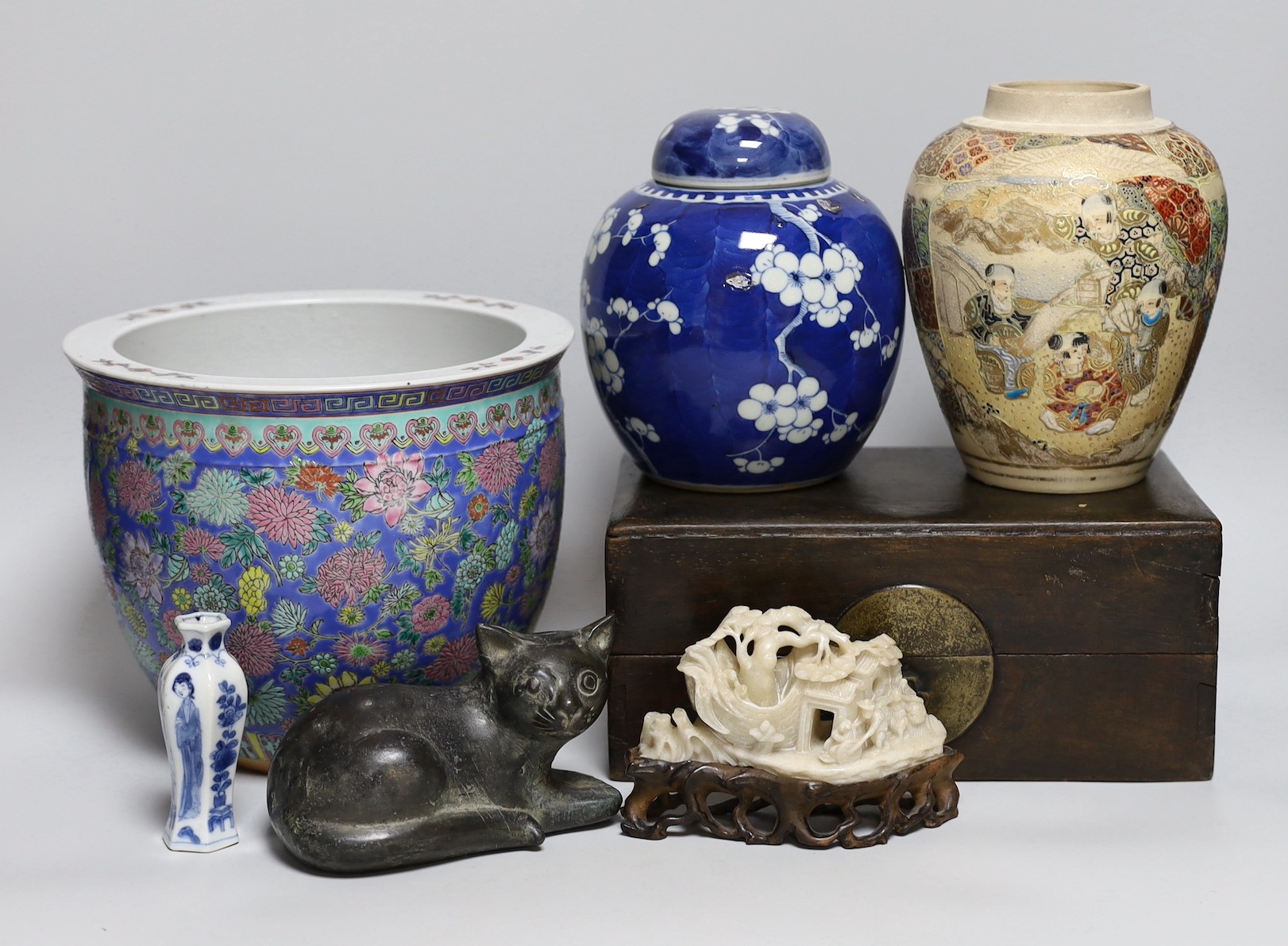A Chinese Kangxi blue and white miniature vase, 9cm tall, a 19th century Chinese wood writing box, a famille rose jardiniere, blue and white jar and cover etc.